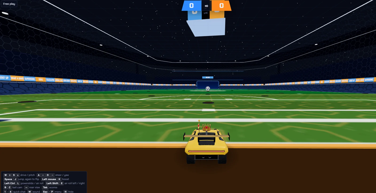 A gold car in free play facing the blue goal across the Nitro Pitch field